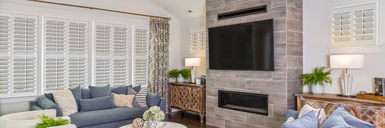 Interior shutters in Lorain County living room with fireplace