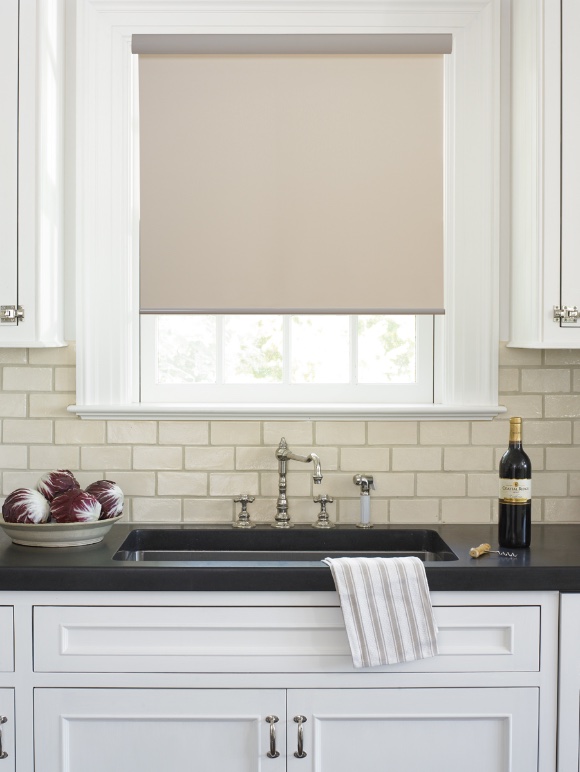 Roller shades in a kitchen window