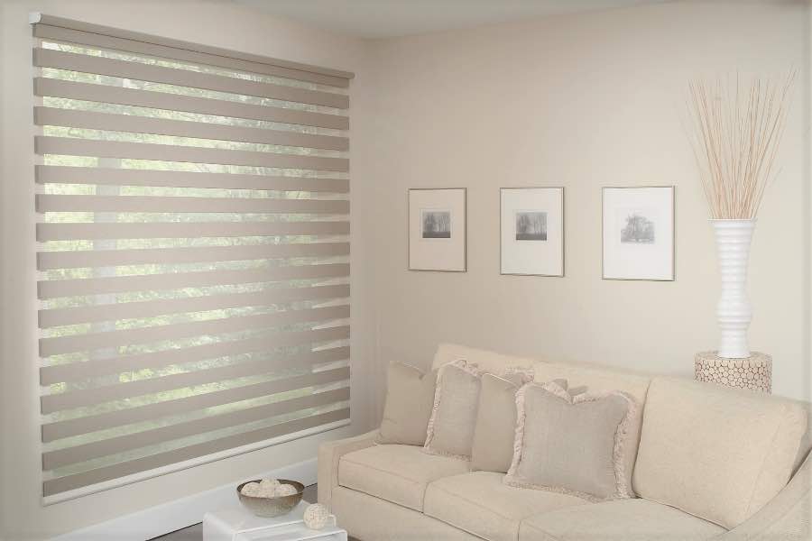 Zebra shades give you a unique combination of light control and style that benefits your Cleveland home. Zebra shade allows filtered light into a living room