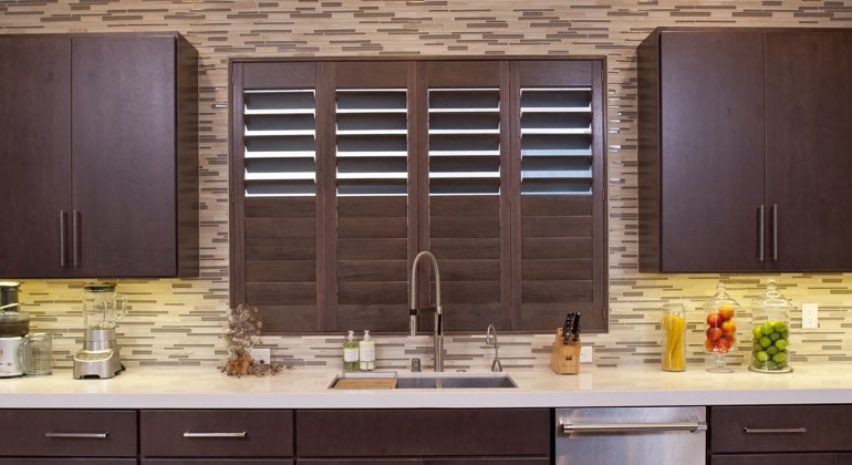 Divider rail shutters in a Cleveland kitchen. Cleveland cafe kitchen shutters