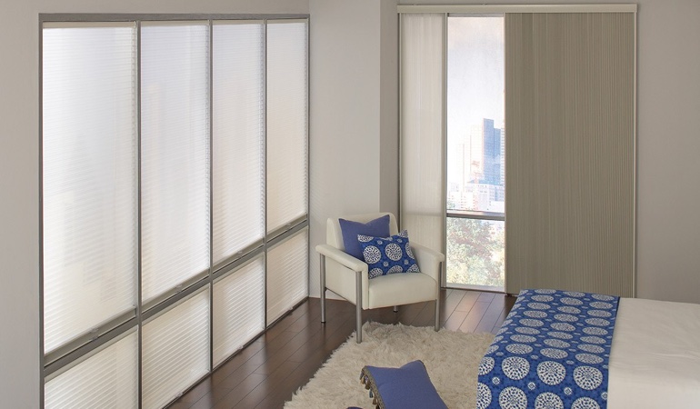 Cell shades are another option to support a minimalist design. Cellular shades in a minimalistic apartment.