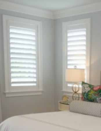 Hidden tilt rod shutters open. Plantation shutters with hidden tilt rods in Cleveland
