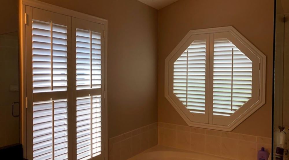 Octagon window treatments Octagon window in a Cleveland bathroom