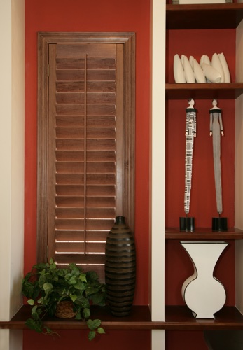 You can even coordinate your wood shutters with shelving. Cleveland wood shutter shelving