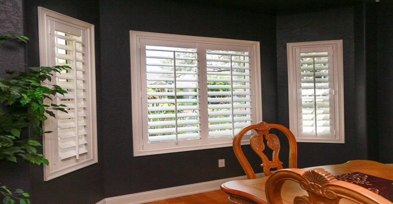 White Plantation Shutters In Dining Room With Dark Paint White Plantation Shutters In Dining Room With Dark Paint