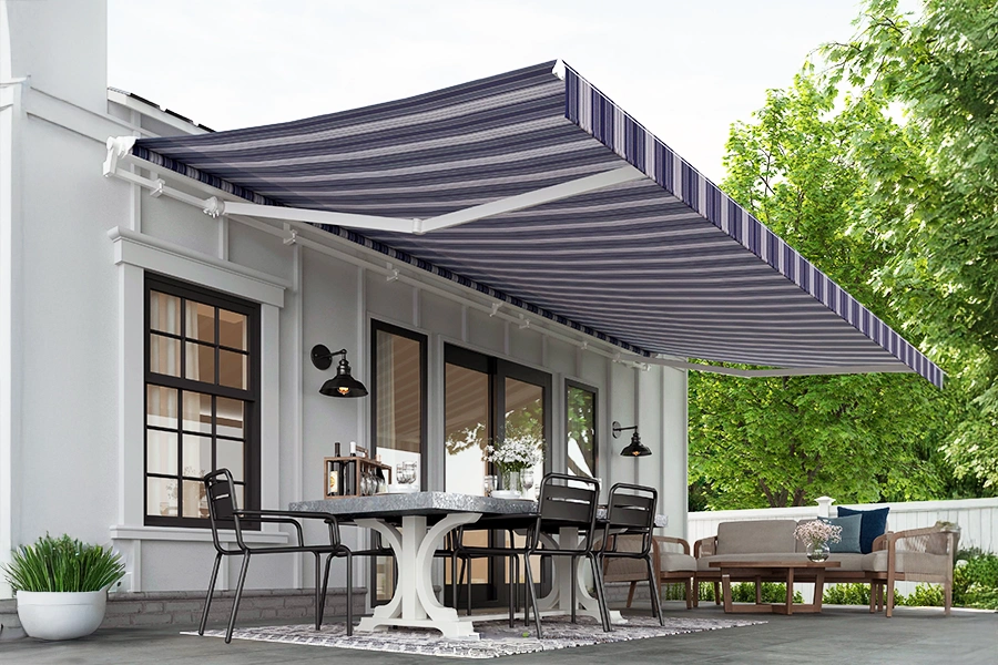 Underside of a striped awning over a furnished patio