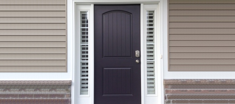 Entry Door Sidelight Shutters In Cleveland, Ohio Entry Door Sidelight Shutters Next To Black Door In Cleveland, Ohio