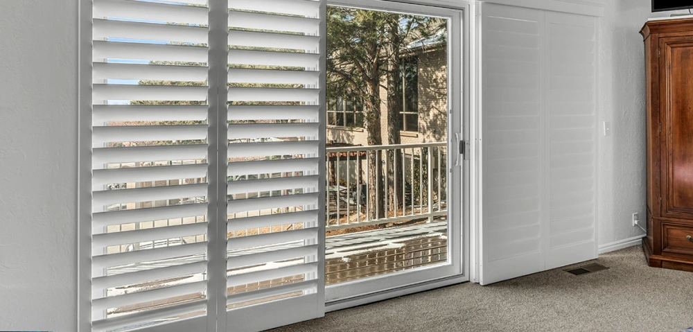 Bifold shutters on sliding glass doors